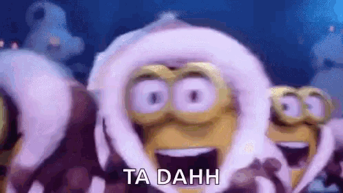 animated image from the minions movie with them standing in front of a yeti in parkas saying "ta-da"